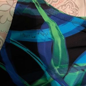 Blue/green ribboned pattern gymnastics leotard